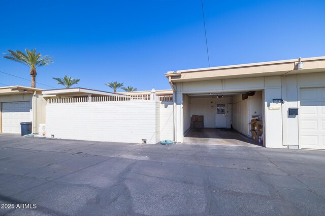 garage with fence