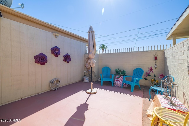 view of patio with a fenced backyard