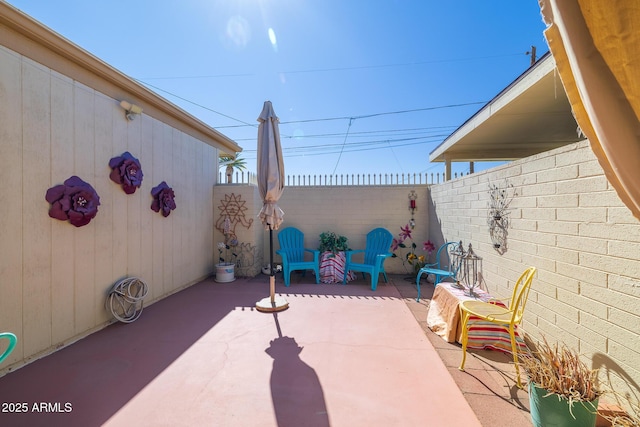 view of patio / terrace featuring a fenced backyard