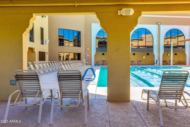 pool with a patio