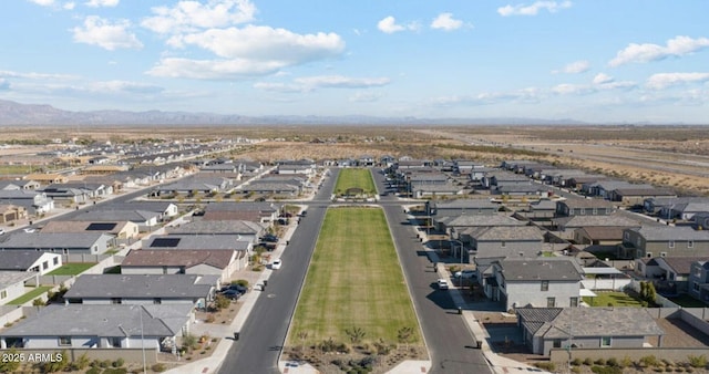 bird's eye view featuring a mountain view and a residential view