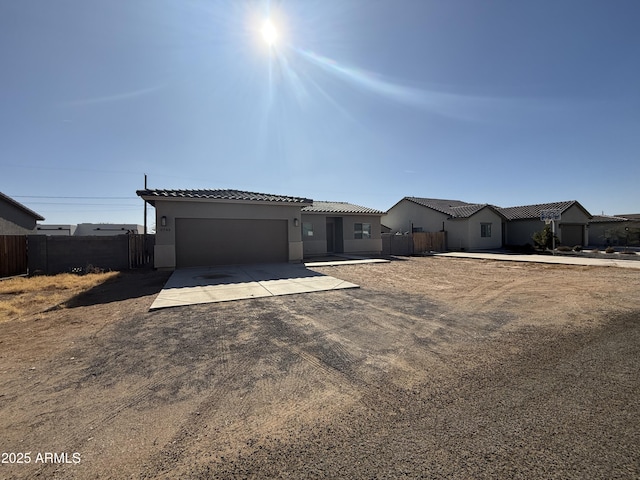 view of front of home with a garage