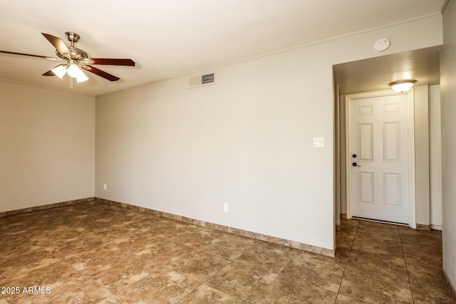 4062 W Eva St, Phoenix, AZ 85051 - spare room with a ceiling fan, a smoke detector, and baseboards