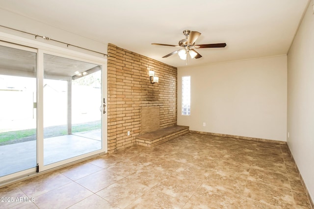 4062 W Eva St, Phoenix, AZ 85051 - empty room featuring brick wall, healthy amount of natural light, and a ceiling fan