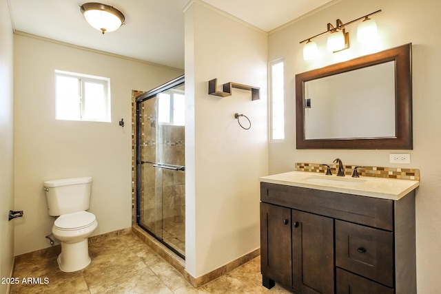 4062 W Eva St, Phoenix, AZ 85051 - full bathroom featuring toilet, vanity, a stall shower, crown molding, and baseboards