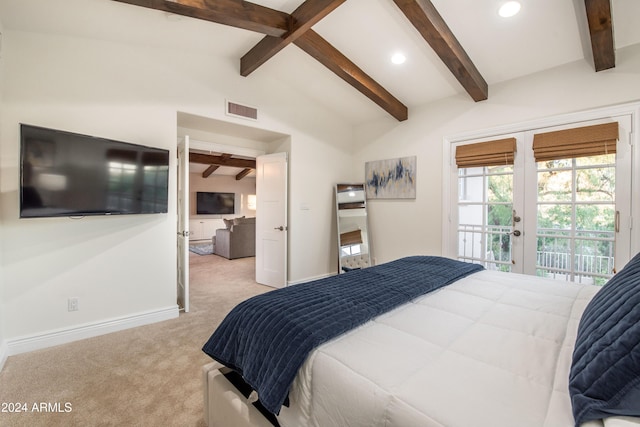 carpeted bedroom featuring access to exterior, vaulted ceiling with beams, and french doors