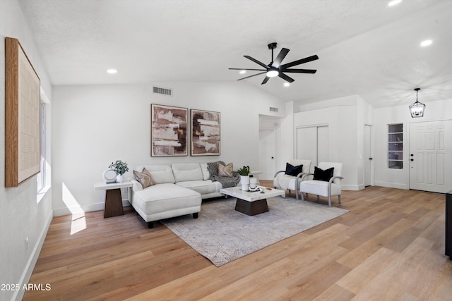 4439 W Cielo Grande, Glendale, AZ 85310 - living room featuring recessed lighting, lofted ceiling, a ceiling fan, and light wood-style floors