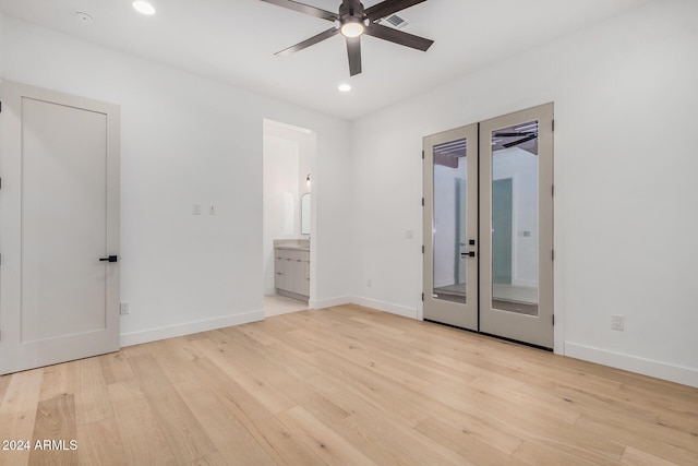 unfurnished bedroom featuring access to outside, french doors, ensuite bath, light hardwood / wood-style flooring, and ceiling fan