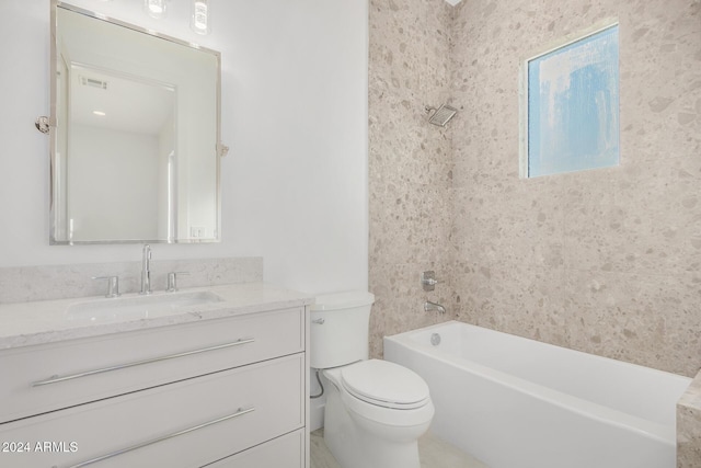 full bathroom featuring vanity, toilet, and tiled shower / bath combo