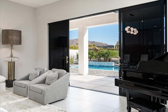 tiled living room with a mountain view