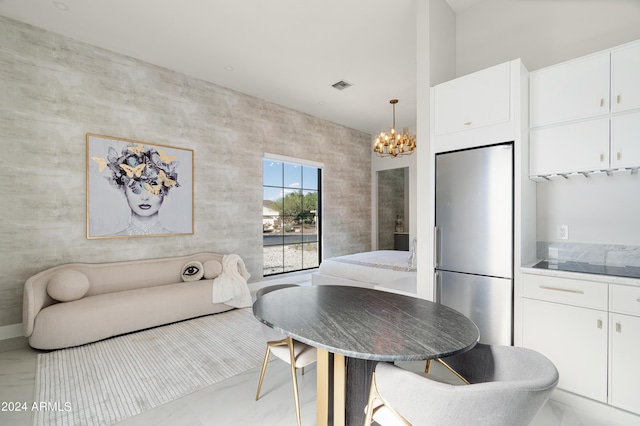 dining room featuring a notable chandelier