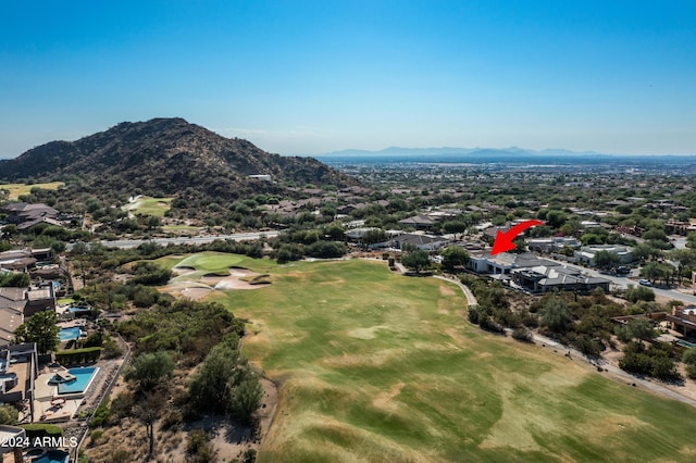 birds eye view of property featuring a mountain view