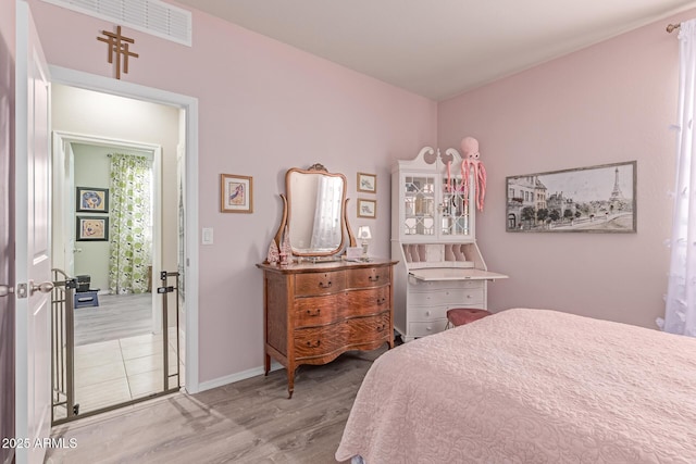 9429 E Grapefruit Dr, Florence, AZ 85132 - bedroom with wood finished floors and baseboards