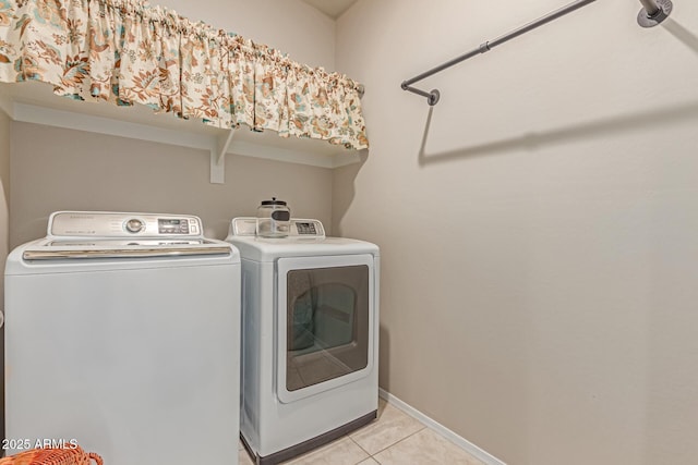 9429 E Grapefruit Dr, Florence, AZ 85132 - laundry area featuring washer and dryer, light tile patterned flooring, and baseboards