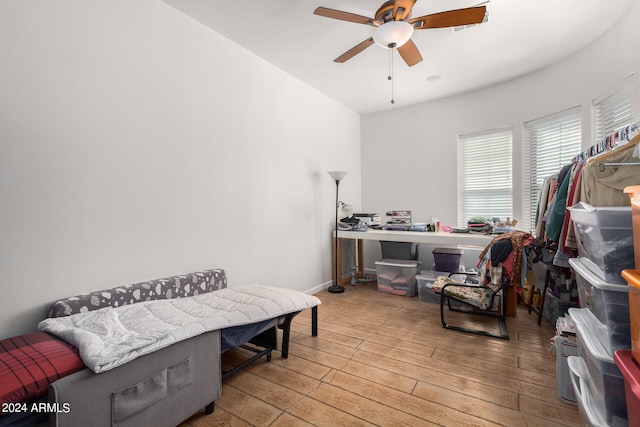 office area with ceiling fan and light hardwood / wood-style flooring