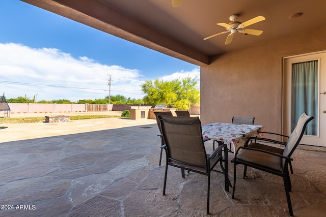 view of patio featuring ceiling fan