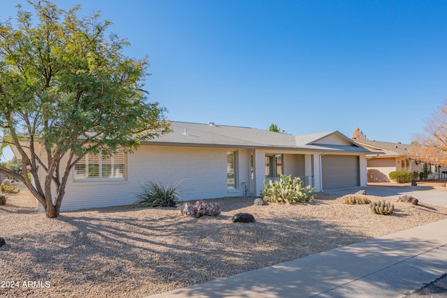 ranch-style house with a garage