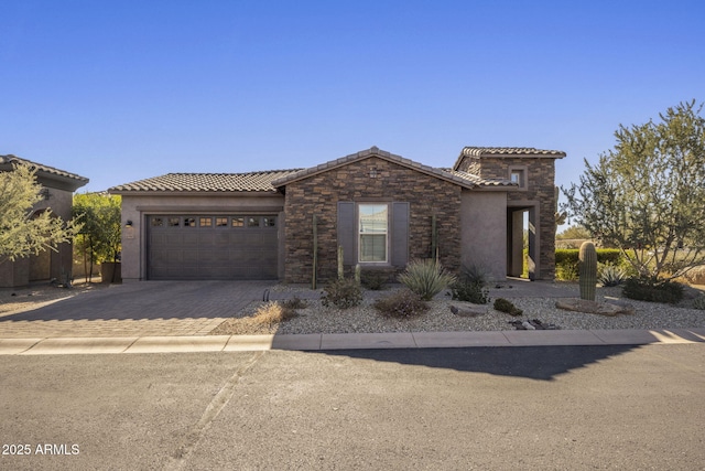 view of front of home with a garage