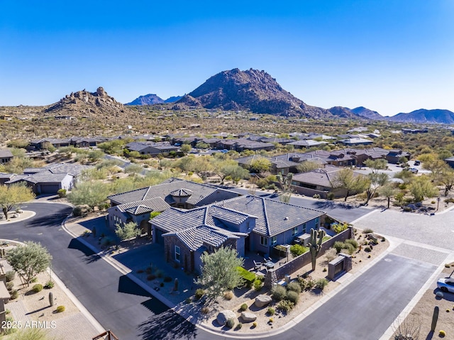 birds eye view of property featuring a mountain view