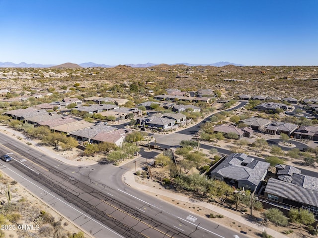 drone / aerial view featuring a mountain view