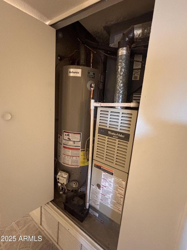 utility room with water heater