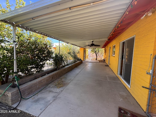 view of patio / terrace featuring ceiling fan