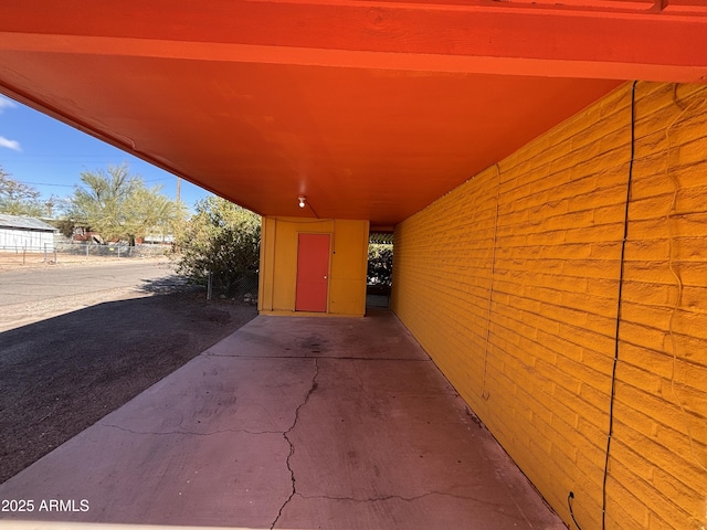 view of patio featuring fence