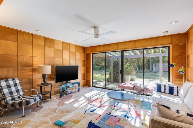 living room featuring ceiling fan