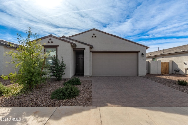 view of front of property with a garage