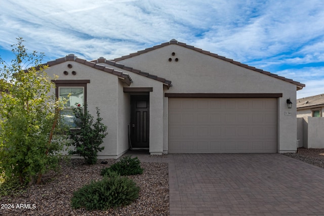 view of front of property featuring a garage