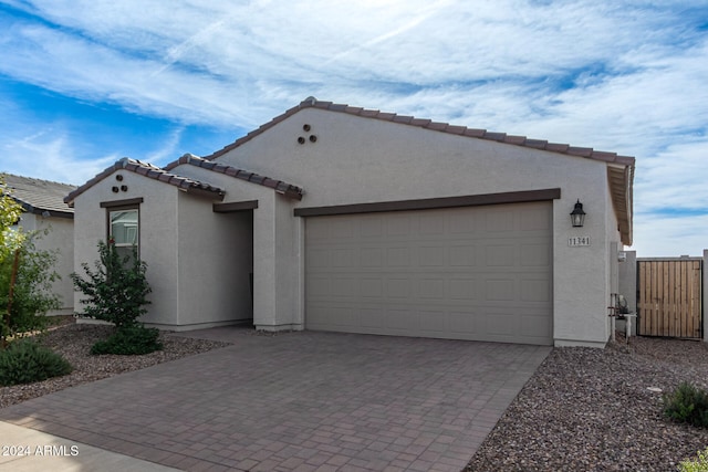 view of front of home with a garage