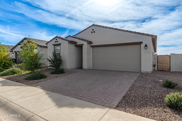 view of front of home with a garage