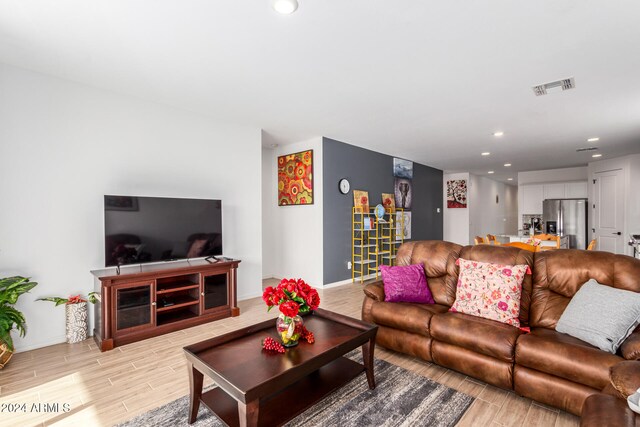 living room featuring light wood-type flooring