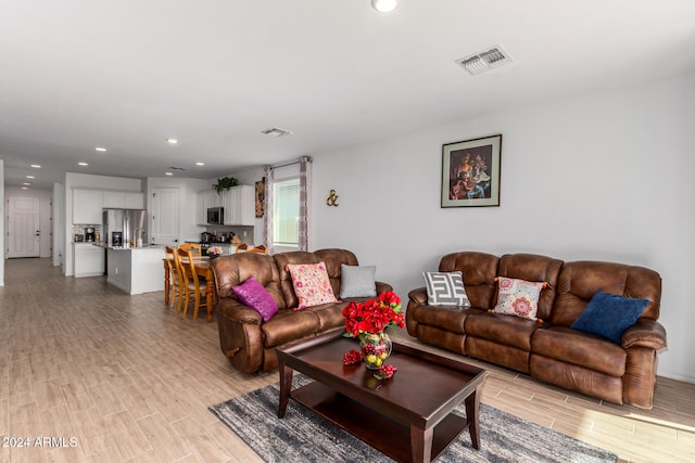 living room with light wood-type flooring