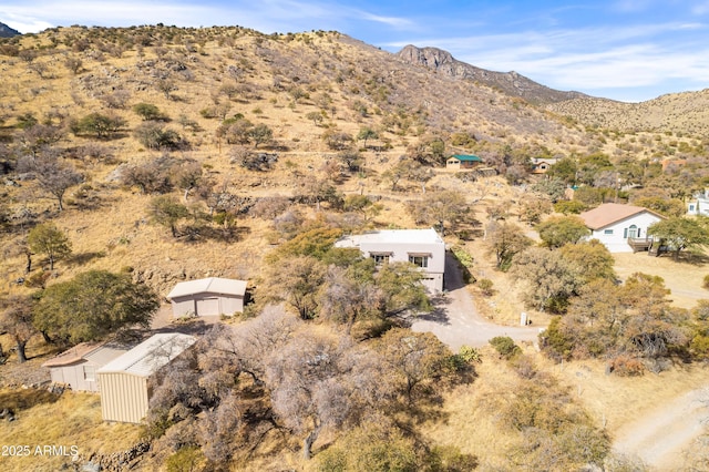 drone / aerial view featuring a mountain view