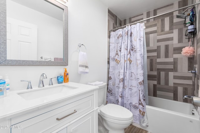 full bathroom featuring vanity, shower / tub combo with curtain, and toilet