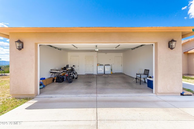 garage with separate washer and dryer