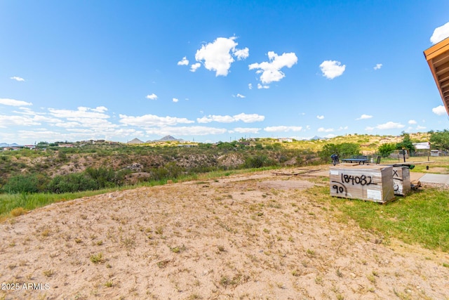 view of yard with a mountain view