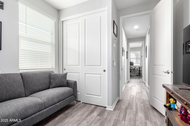 3585 W Oil Well Rd, San Tan Valley, AZ 85144 - living room featuring baseboards and light wood-style floors