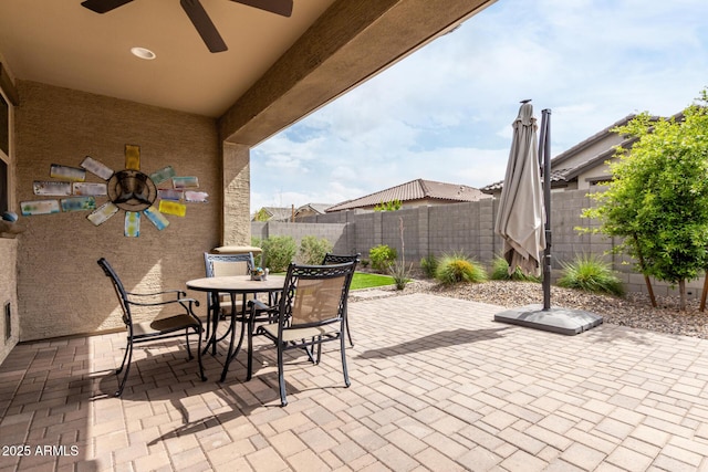 3585 W Oil Well Rd, San Tan Valley, AZ 85144 - view of patio featuring outdoor dining area, a fenced backyard, and ceiling fan