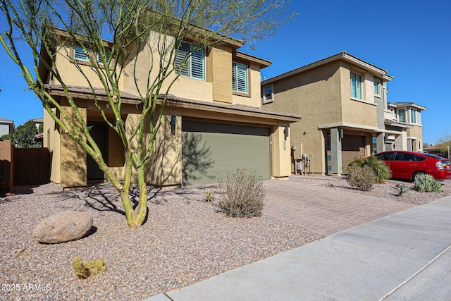 view of front of home with a garage