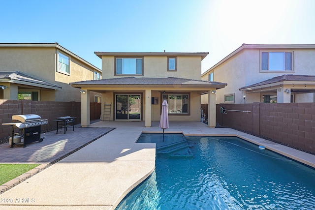 rear view of property with a patio