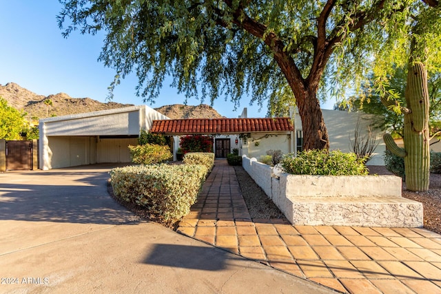 view of front of home with a mountain view