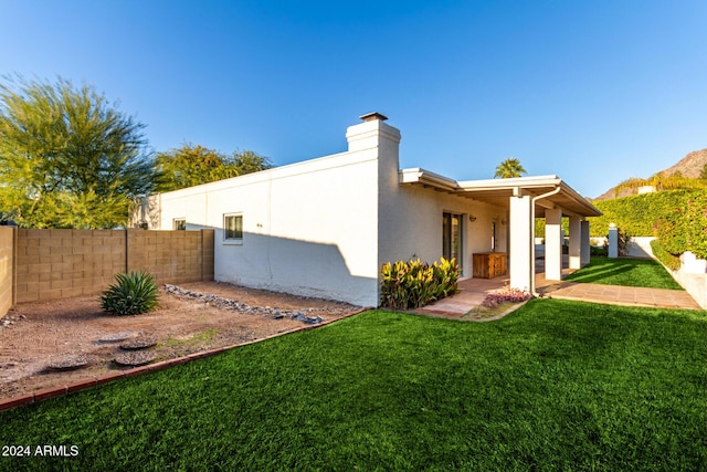 view of property exterior featuring a yard