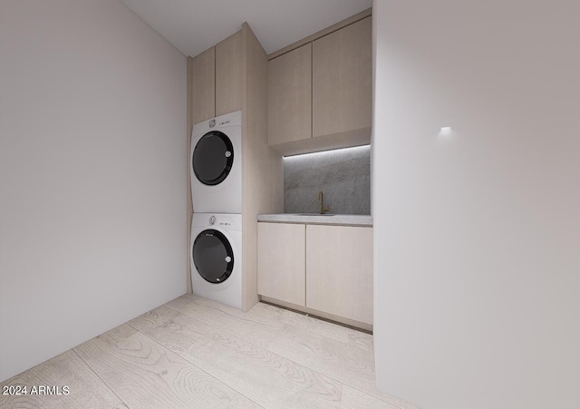 7151 E Rancho Vista Dr Unit 5001, Scottsdale, AZ 85251 - washroom with stacked washer and dryer and cabinet space