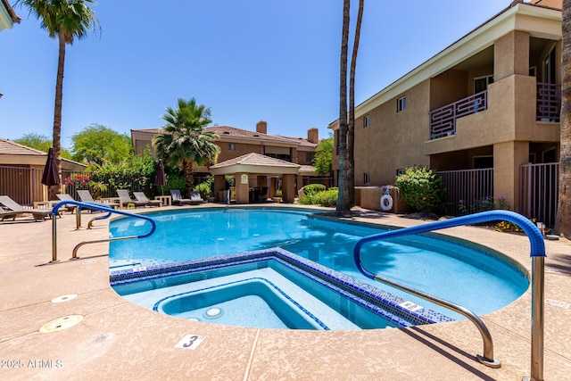 1411 E Orangewood Ave Unit 233, Phoenix, AZ 85020 - community pool with a patio area, a community hot tub, and a gazebo