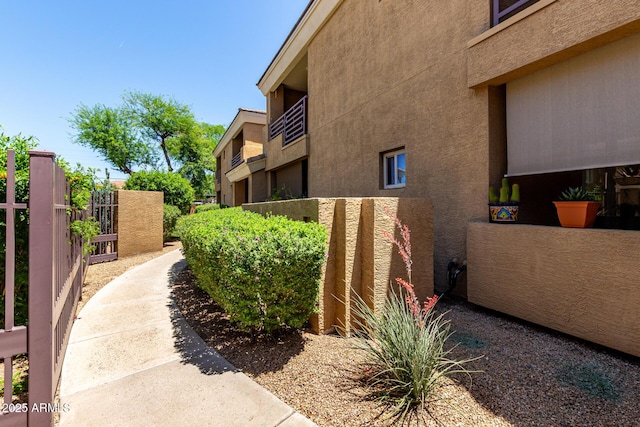 1411 E Orangewood Ave Unit 233, Phoenix, AZ 85020 - view of property exterior featuring stucco siding