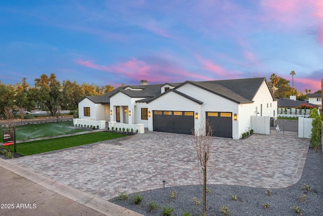 modern farmhouse style home featuring a garage