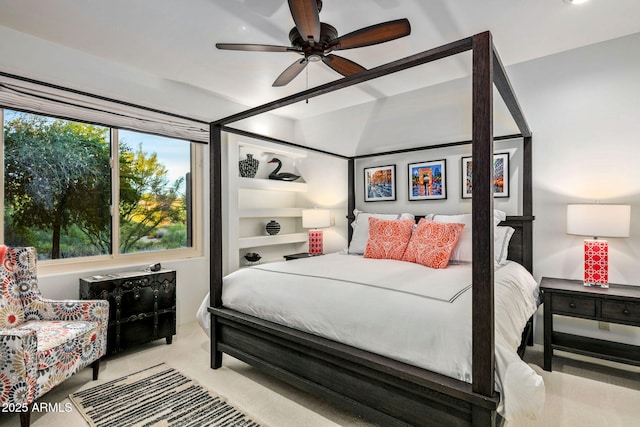 bedroom featuring ceiling fan and light colored carpet