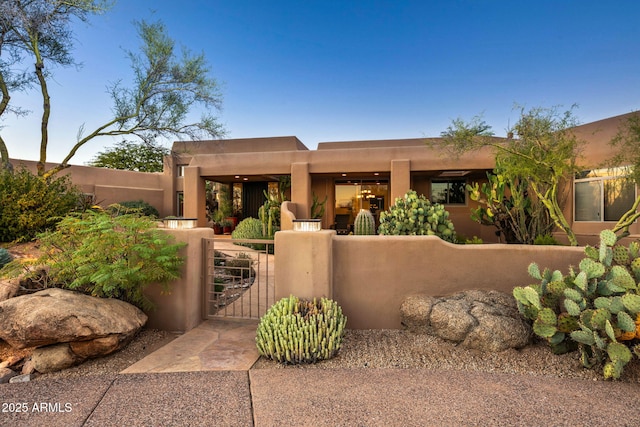 view of pueblo revival-style home